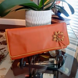 Via Spiga orange leather clutch with flower detail